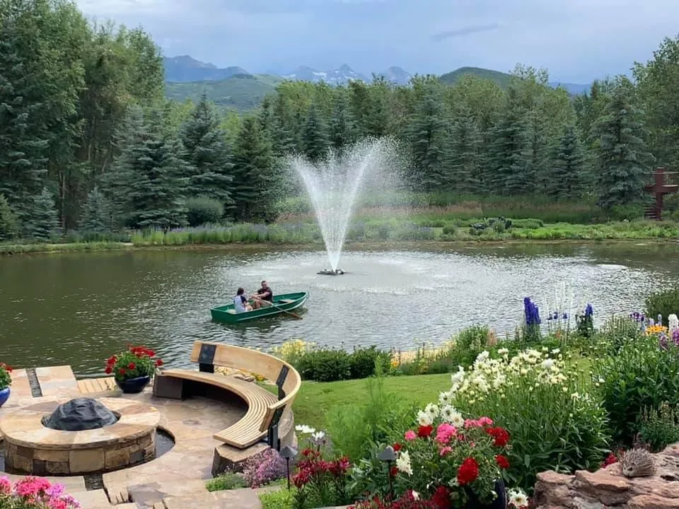Rowboat on Fox Pond, fire-pit terrace